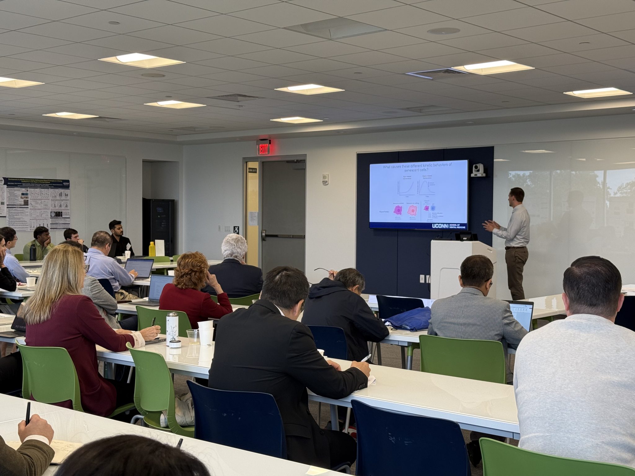 researcher presenting in room